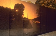 Vietnam Wall and Reflection of the National Monument at Sunrise